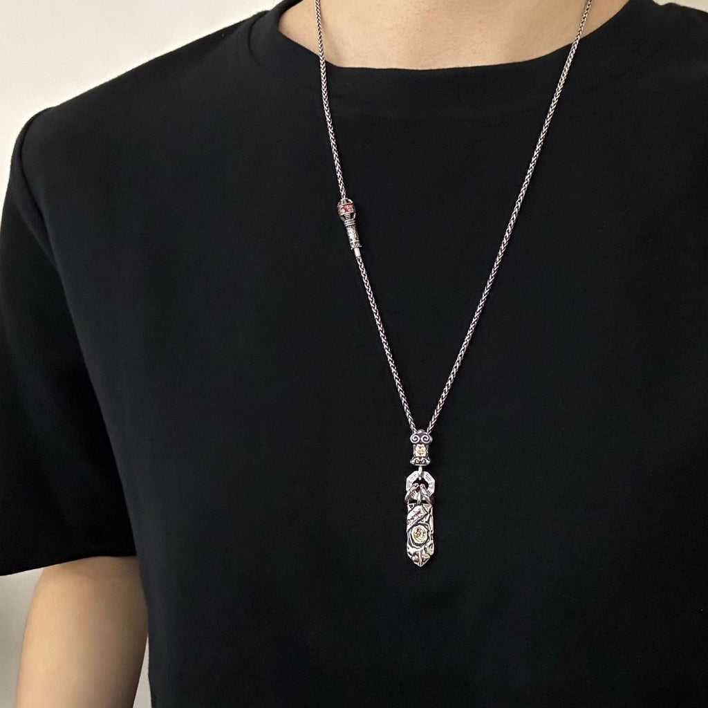 TaoWards Sculpted Ritual Sword Pendant Necklace — worn view
