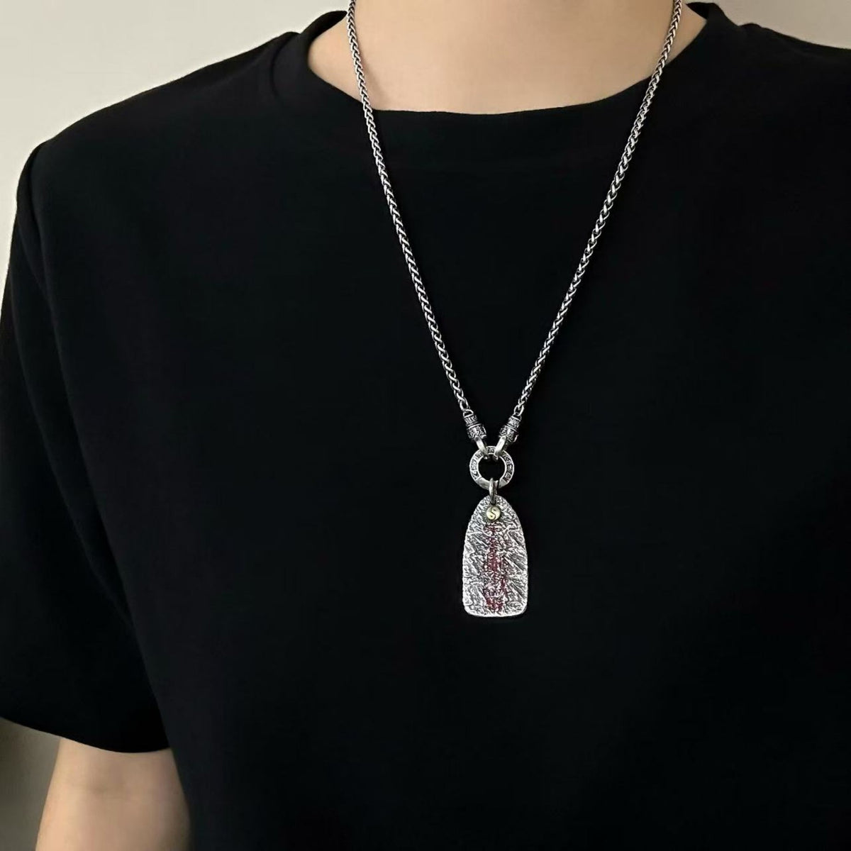 TaoWards Textured Yin Yang Tag Pendant worn with a chain; chain and connectors not included