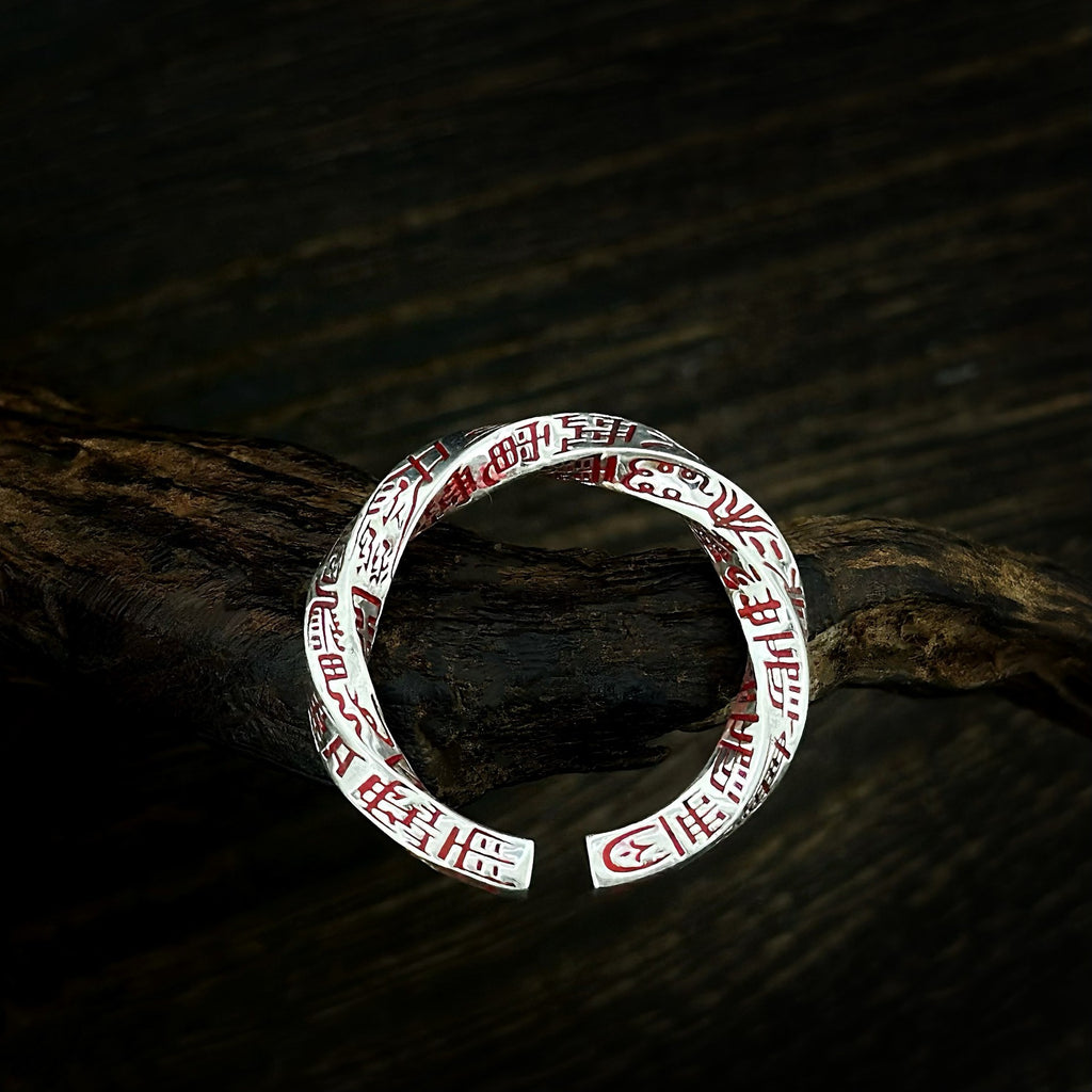 TaoWards Twisted Engraved Open Ring on dark wood
