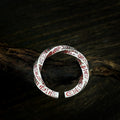 TaoWards Twisted Engraved Open Ring on dark wood