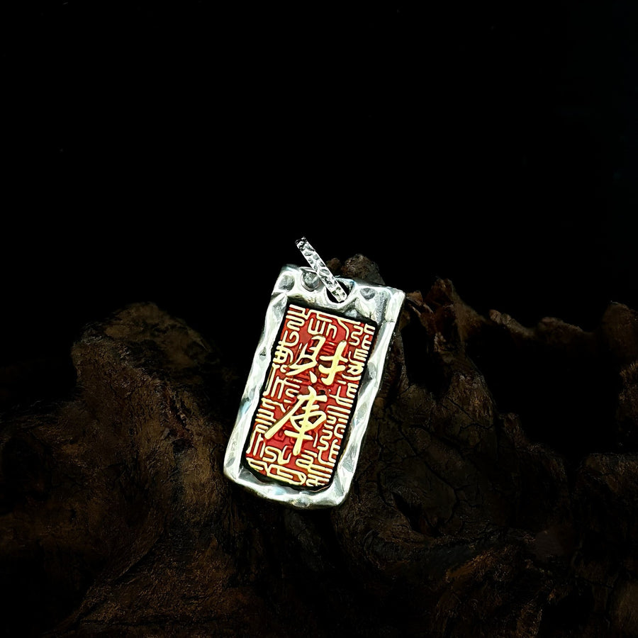 TaoWards Red Engraved Tag Pendant on dark wood