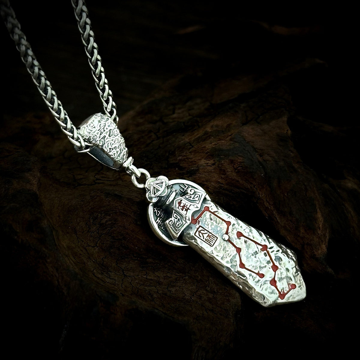 TaoWards sword coin pendant styled on a chain; one pendant, chain not included.