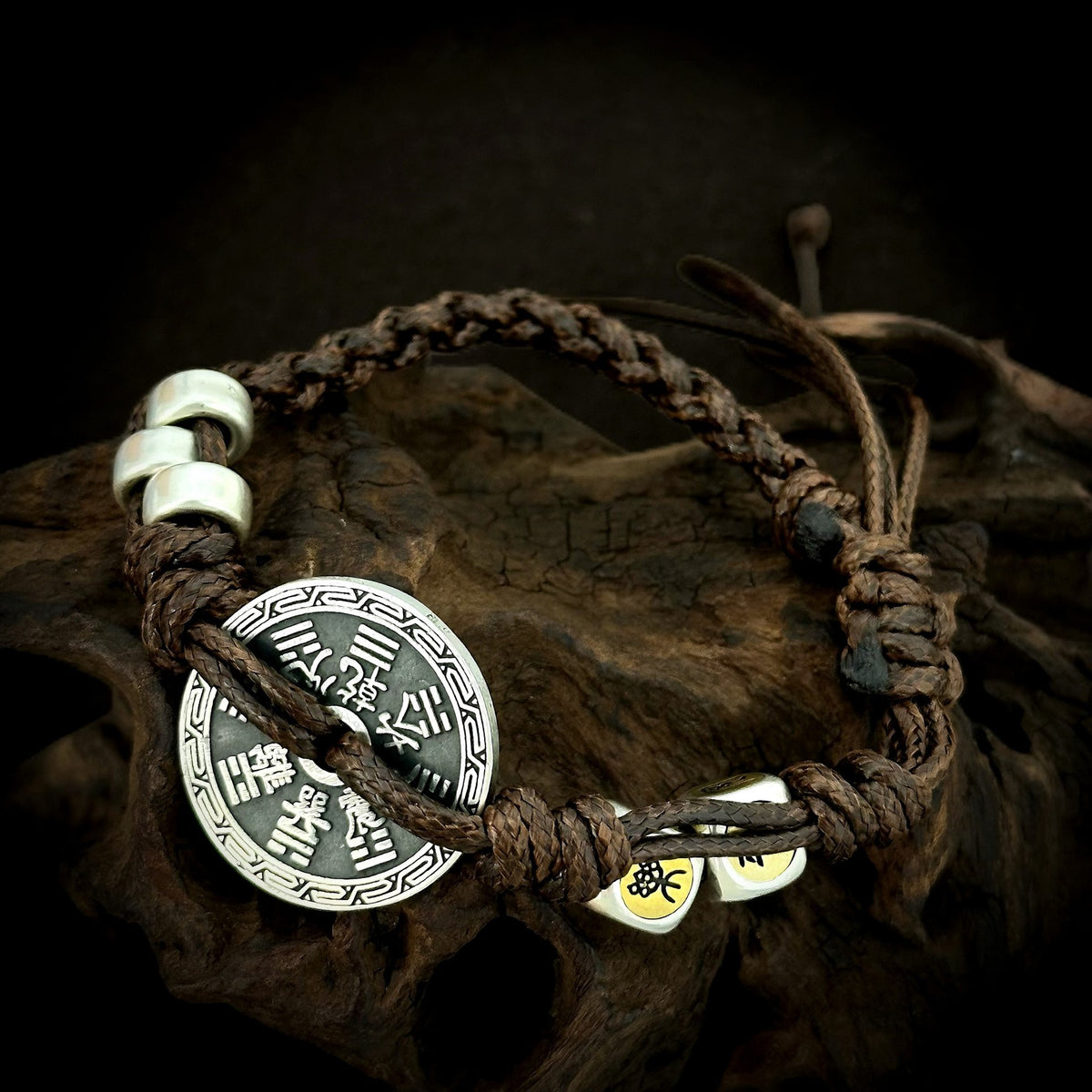 Reverse coin face and knotted closure of TaoWards braided cord bracelet