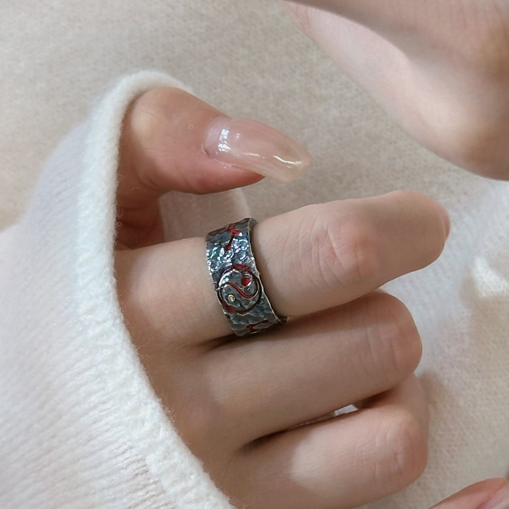TaoWards wide textured ring shown on the hand