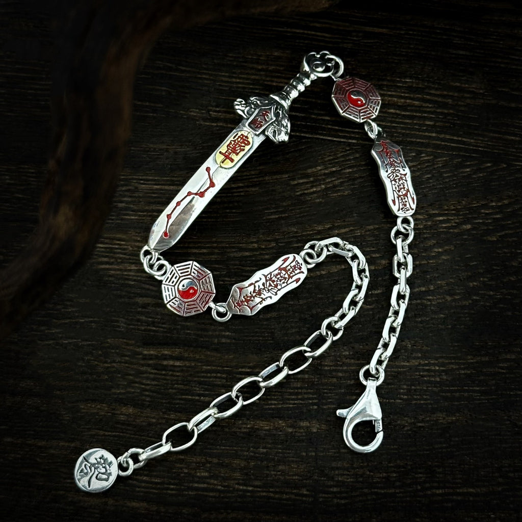 Full TaoWards Seven Star Sword Bracelet with clasp and extension chain on dark wood.