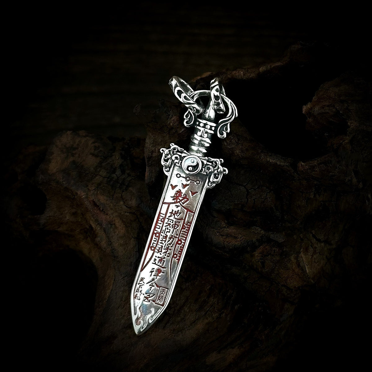 TaoWards Red Engraved Sword Pendant angled detail