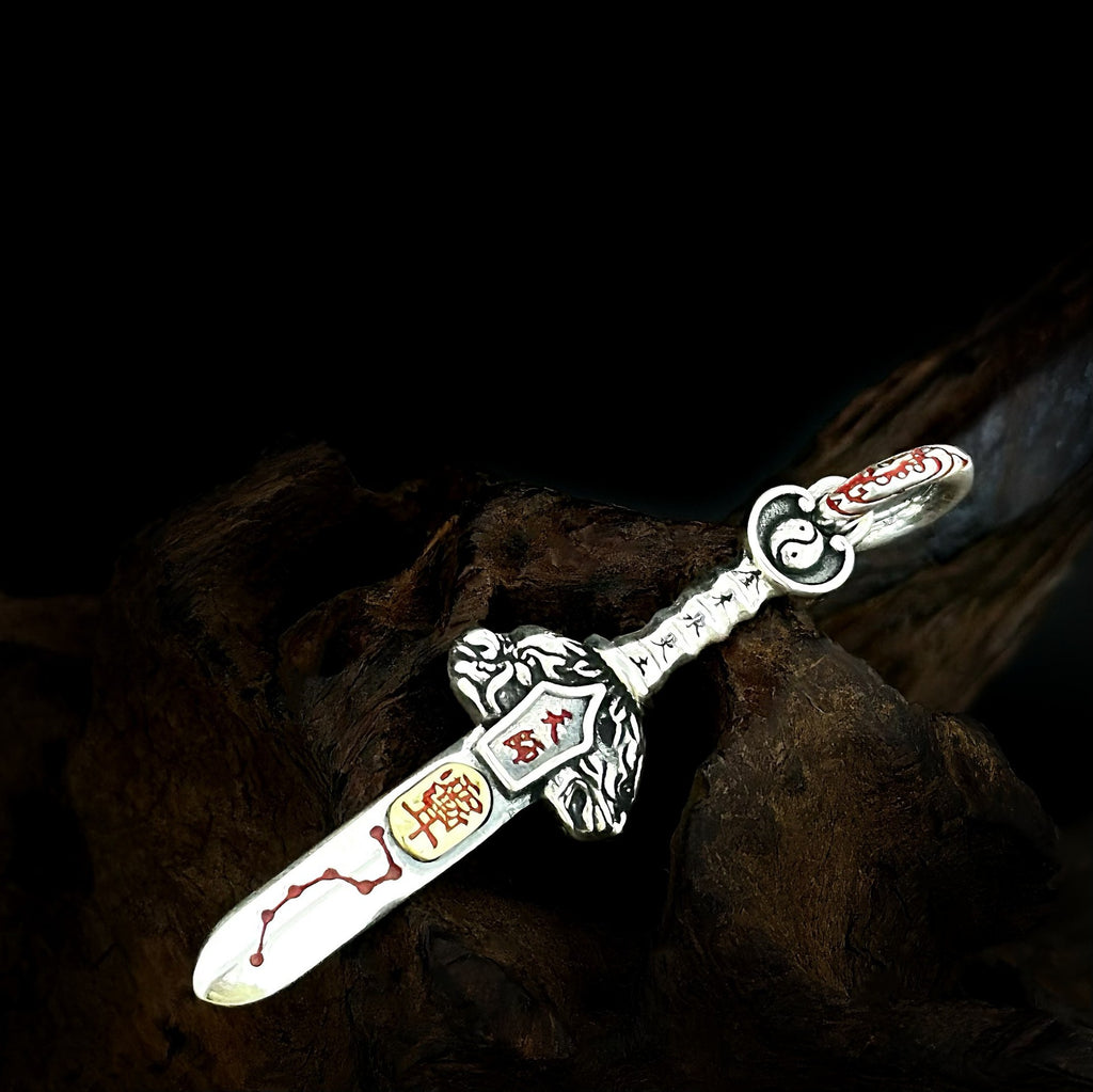 Detail of TaoWards sword pendant guard and engraved handle