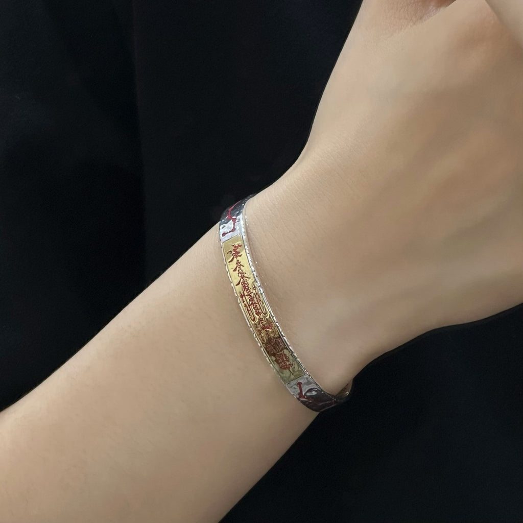 TaoWards Five Wealth Gods Inscription Cuff Bracelet — worn on a wrist