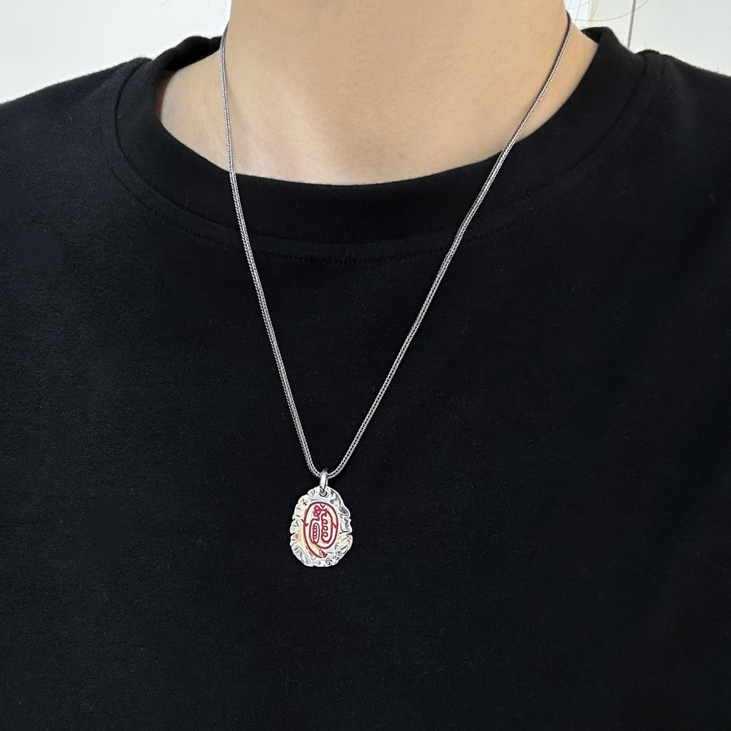TaoWards Red Sigil Oval Pendant worn on a chain; chain not included