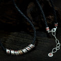 TaoWards black braided cord necklace with seven engraved beads