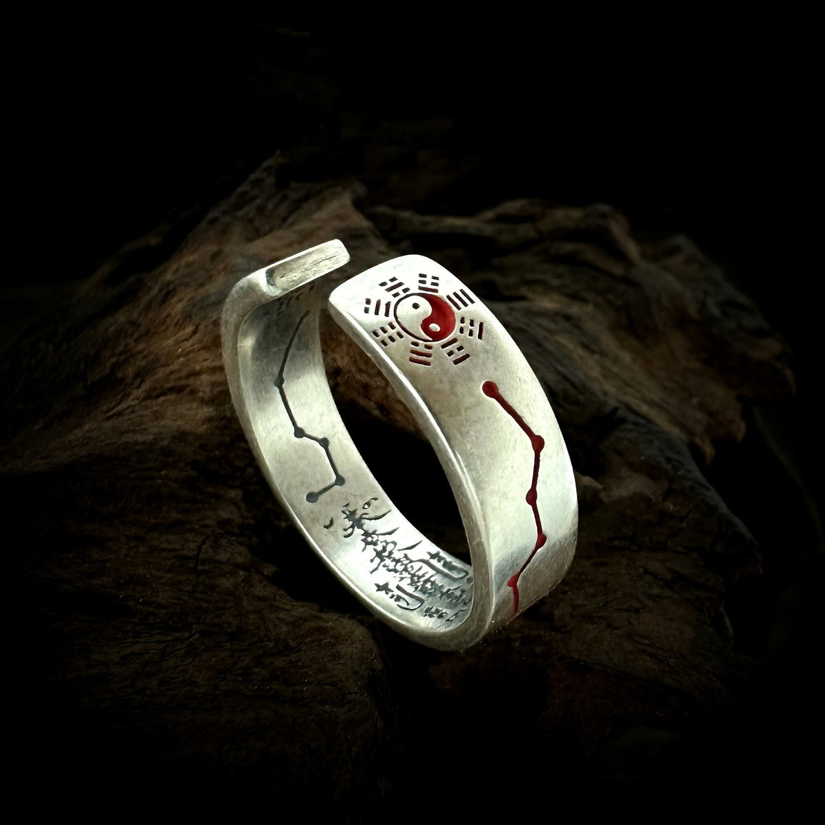 TaoWards open ring showing the yin yang detail, red line pattern and inner engraving