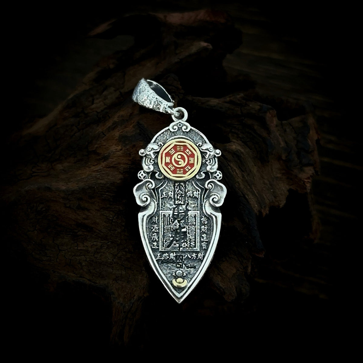 Reverse of TaoWards ornate coin pendant with red and gold-tone coin detail