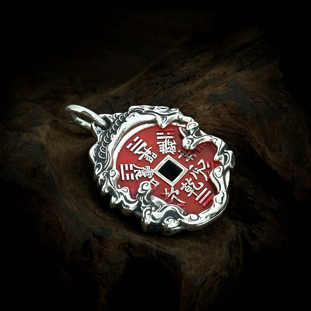 Reverse of TaoWards Tiger Coin Pendant with a red Bagua design