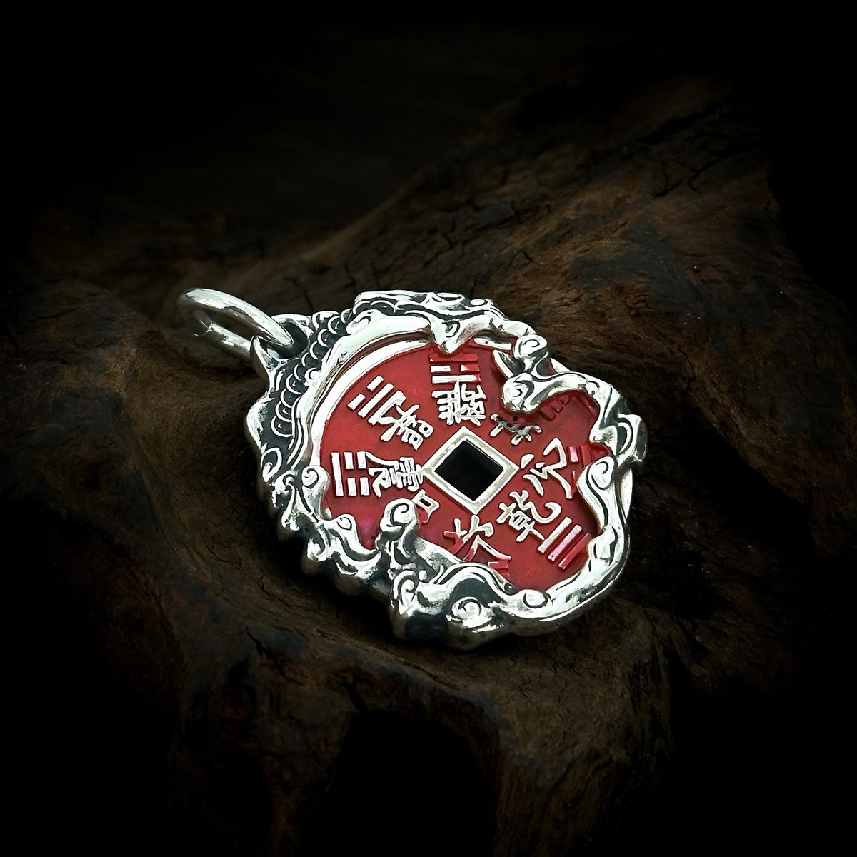 Reverse of TaoWards Tiger Coin Pendant with a red Bagua design